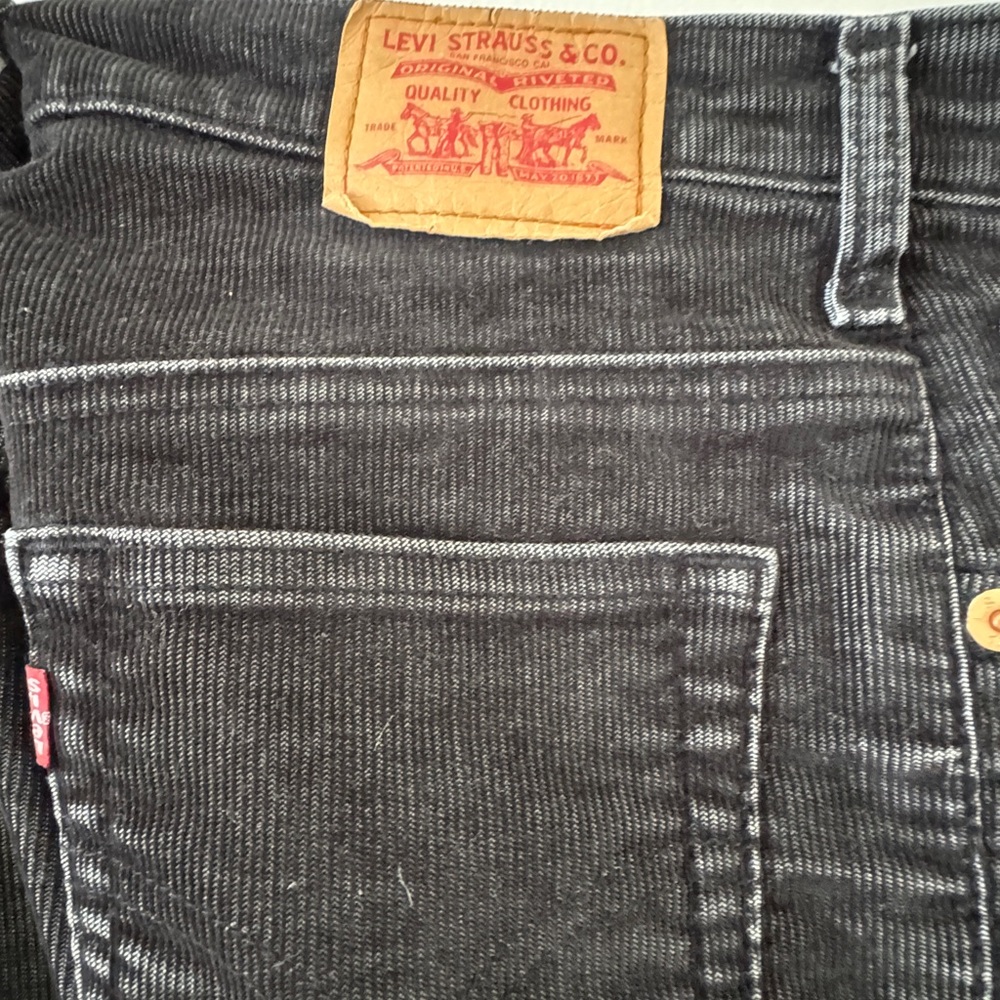 LEVI’S (Vintage): Black corduroy distressed bootcut pants — Good condition